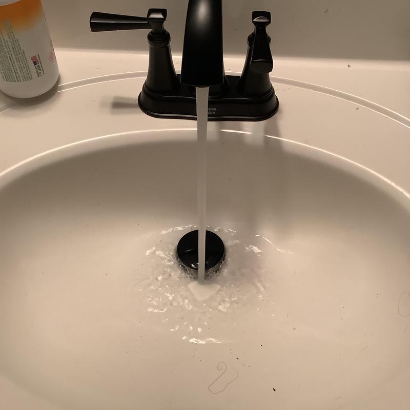 Delta black vanity sink faucet with running water Delta black vanity sink faucet with running water