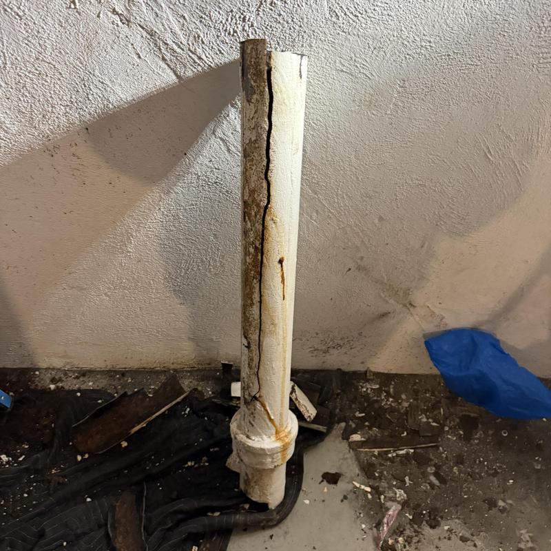 Cracked basement drain pipe in home plumbing system Cracked basement drain pipe in home plumbing system