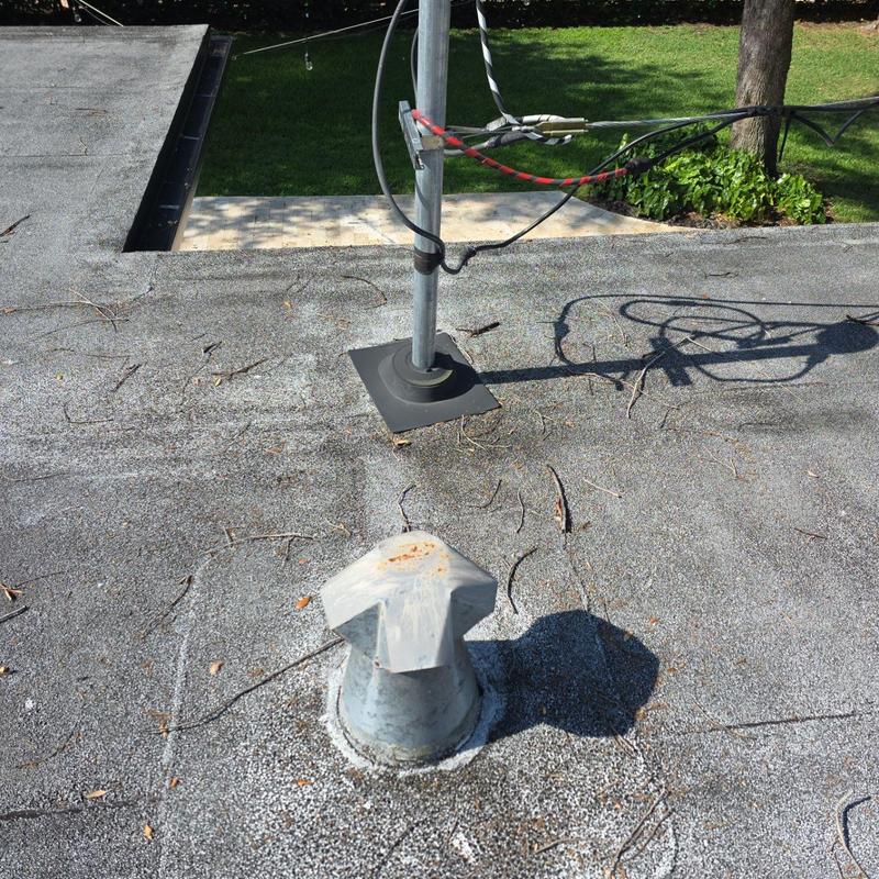 Flat roof ventilation pipe and cable mount on roof