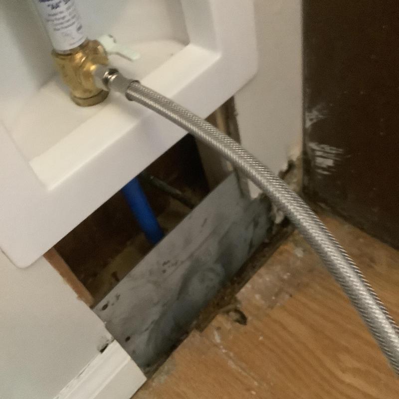 Ice maker box with braided water supply line installation Ice maker box with braided water supply line installation