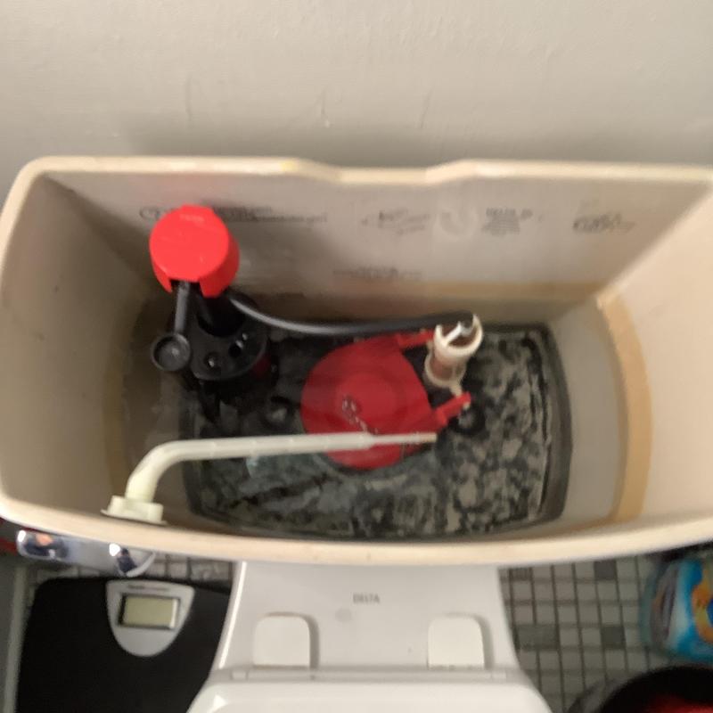 Toilet tank components with water refill valve and flapper Toilet tank components with water refill valve and flapper