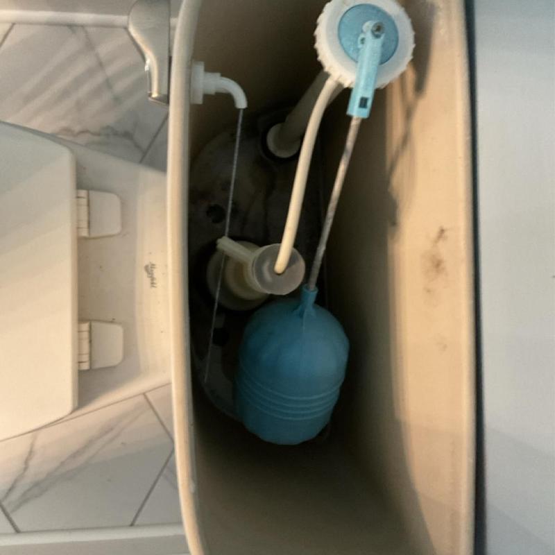 Toilet tank float and fill valve assembly inside tank Toilet tank float and fill valve assembly inside tank
