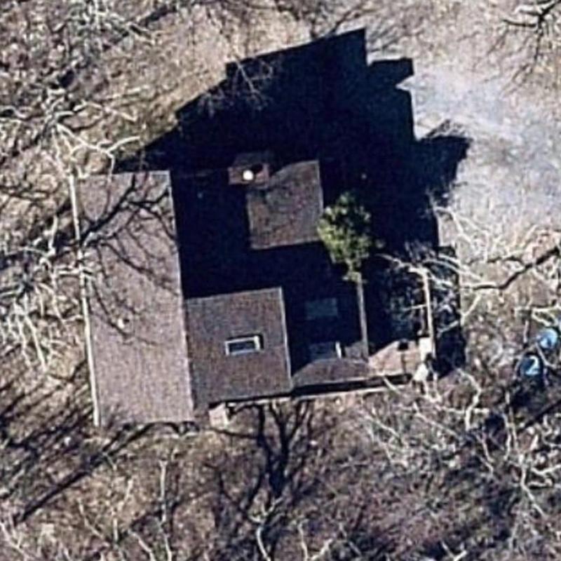 Roof shingles inspection on residential home aerial view Roof shingles inspection on residential home aerial view