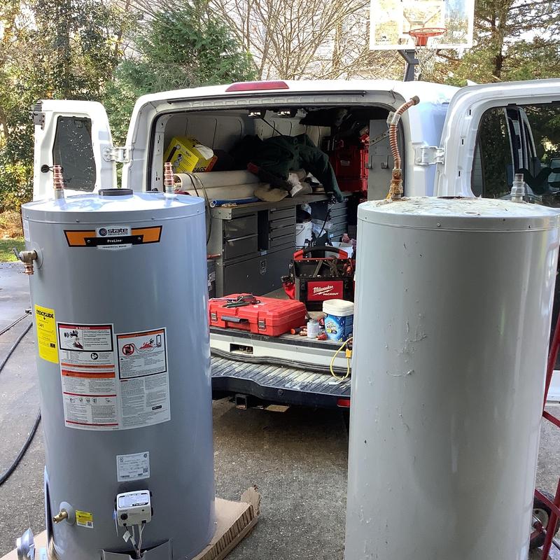 State Pro line water heater next to old unit outdoors State Pro line water heater next to old unit outdoors