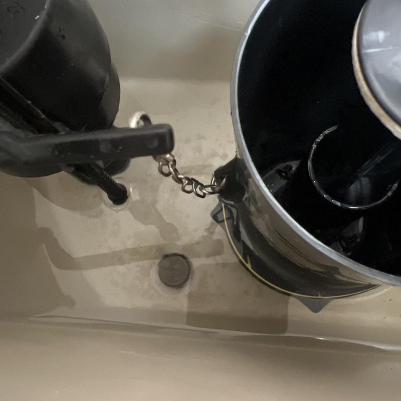 Kohler toilet flush valve and chain inside tank Kohler toilet flush valve and chain inside tank