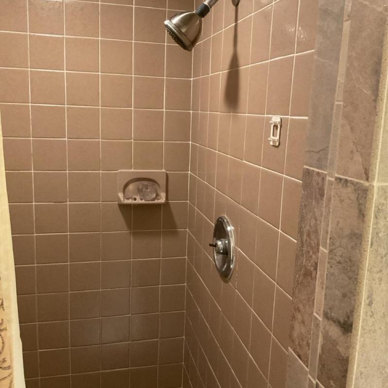 Shower diverter and trim installed in tiled shower Shower diverter and trim installed in tiled shower
