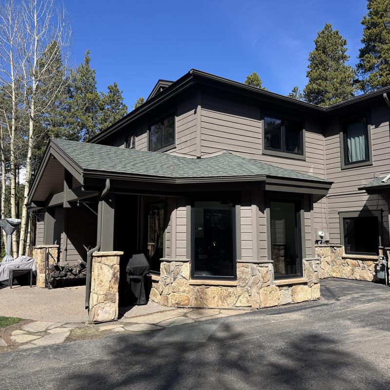 Roof shingles and gutter inspection at Colorado home