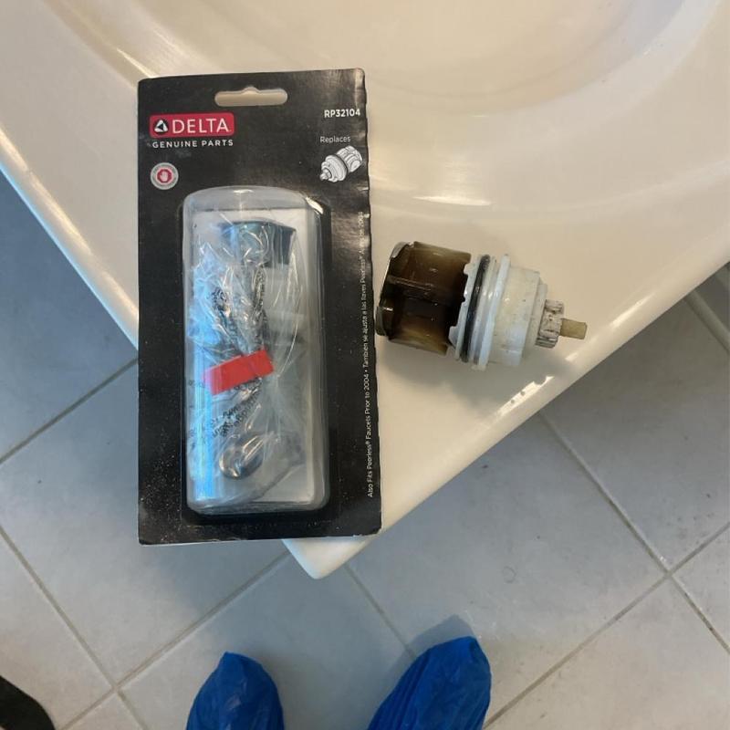 Delta tubshower cartridge replacement parts on sink edge Delta tubshower cartridge replacement parts on sink edge