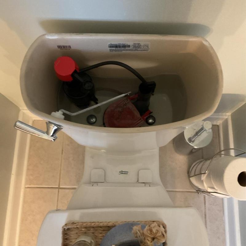 Toilet fill valve inside tank with new parts Toilet fill valve inside tank with new parts