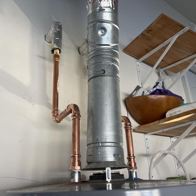 Natural gas water heater with new copper pipes Natural gas water heater with new copper pipes