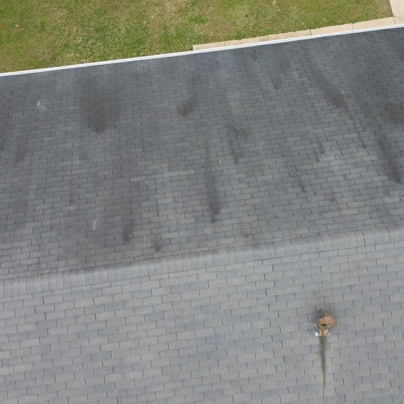Architectural shingle roof with pipe boot and ridge cap Architectural shingle roof with pipe boot and ridge cap
