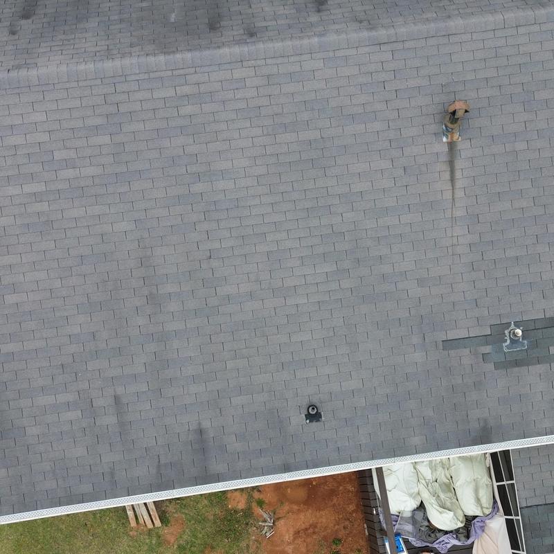 Architectural shingle roof with flashing and pipe boots Architectural shingle roof with flashing and pipe boots