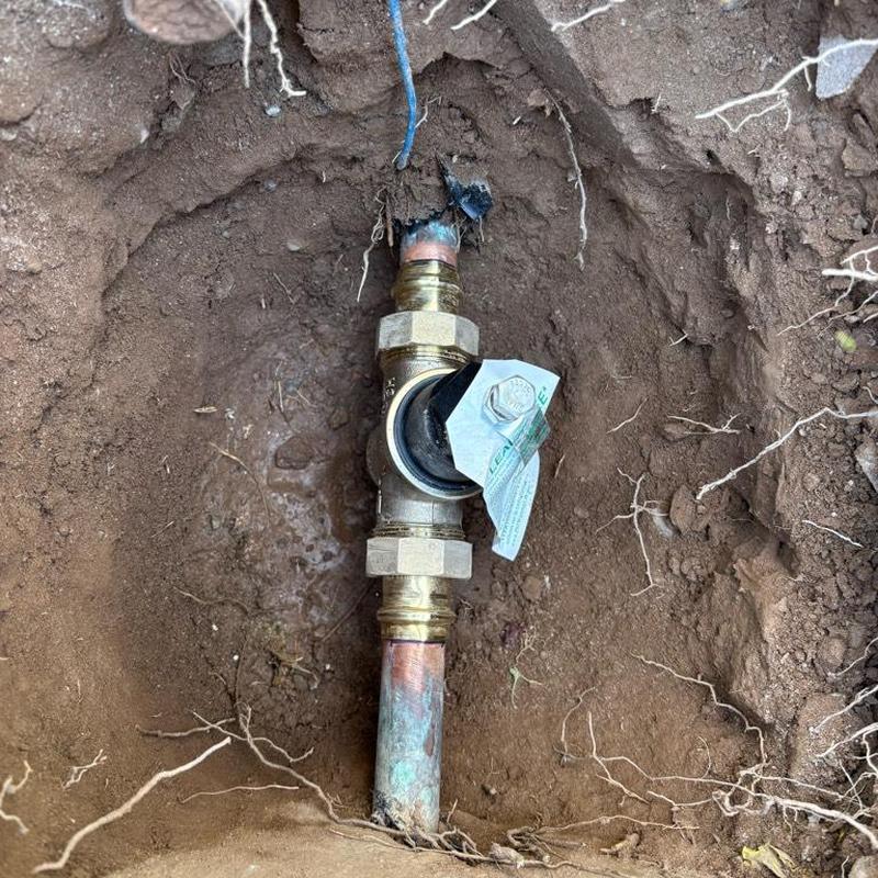 One inch pressure relief valve installed by water meter