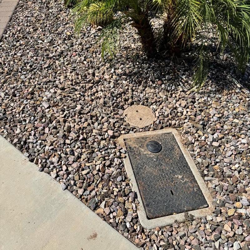 Water main access box with pressure regulator installation