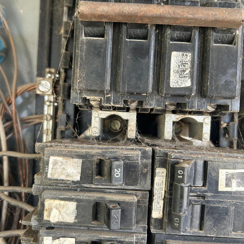 Main electrical panel breaker with corroded connections