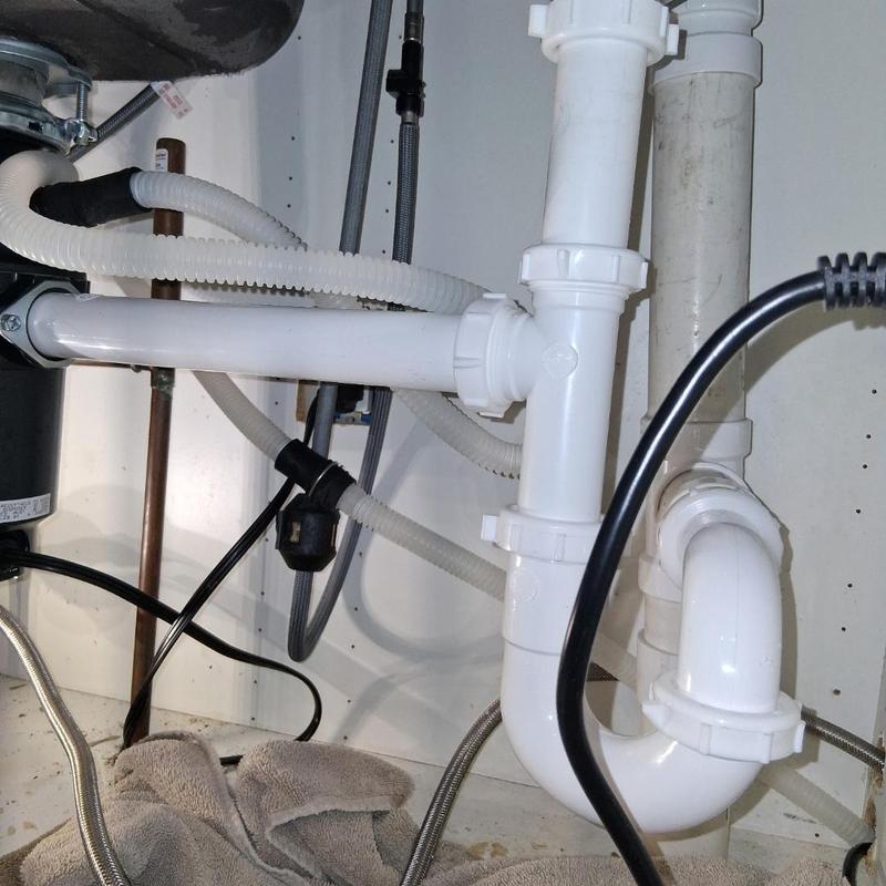 Under sink drain pipes with trap installation