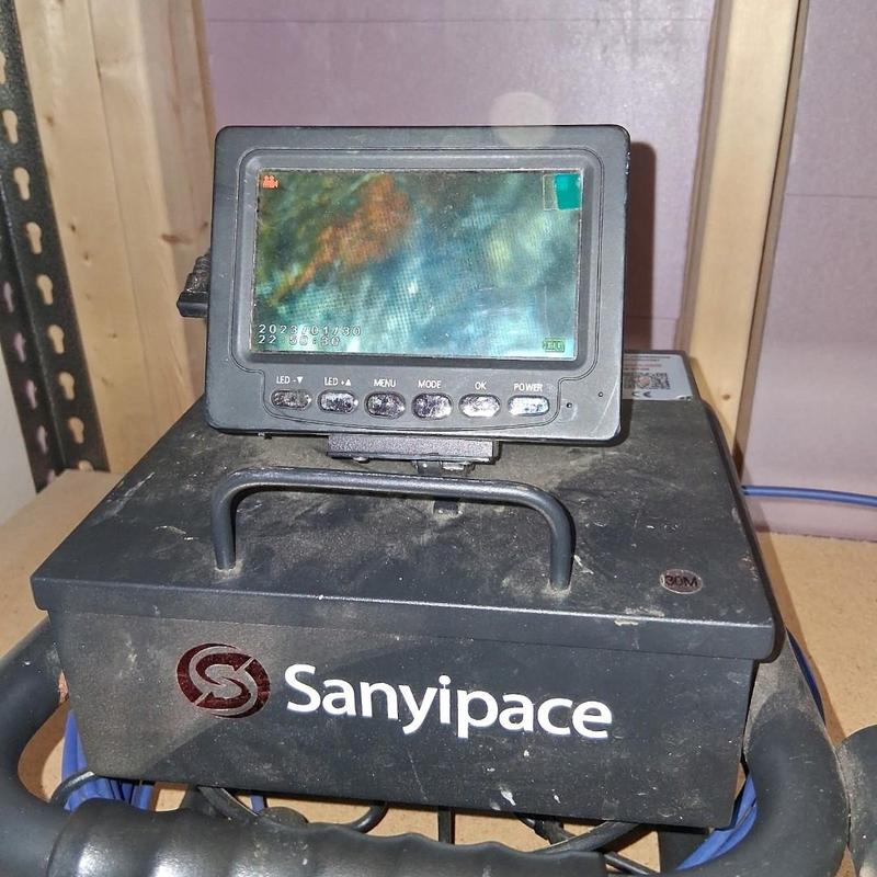 Drain inspection camera monitor on plumbing equipment