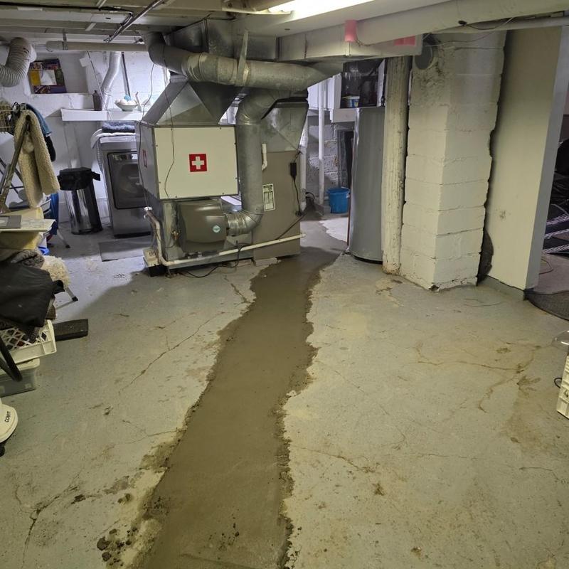 Concrete floor patch from laundry stack to cleanout