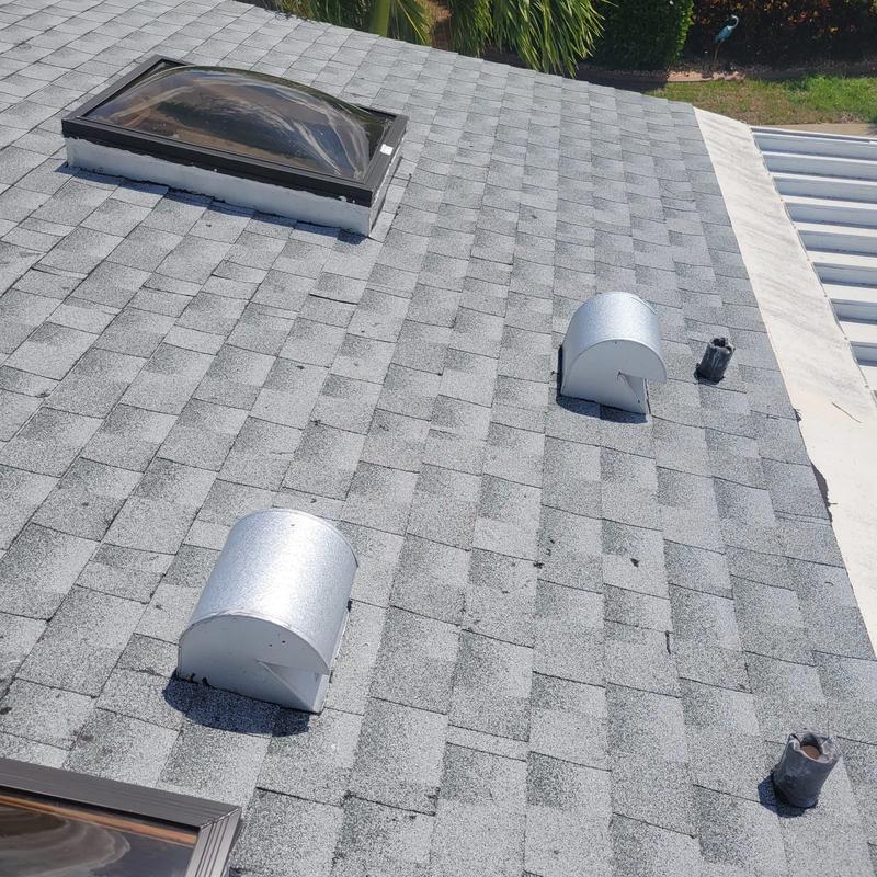 Skylight and roof vents on shingle roof in Florida Skylight and roof vents on shingle roof in Florida