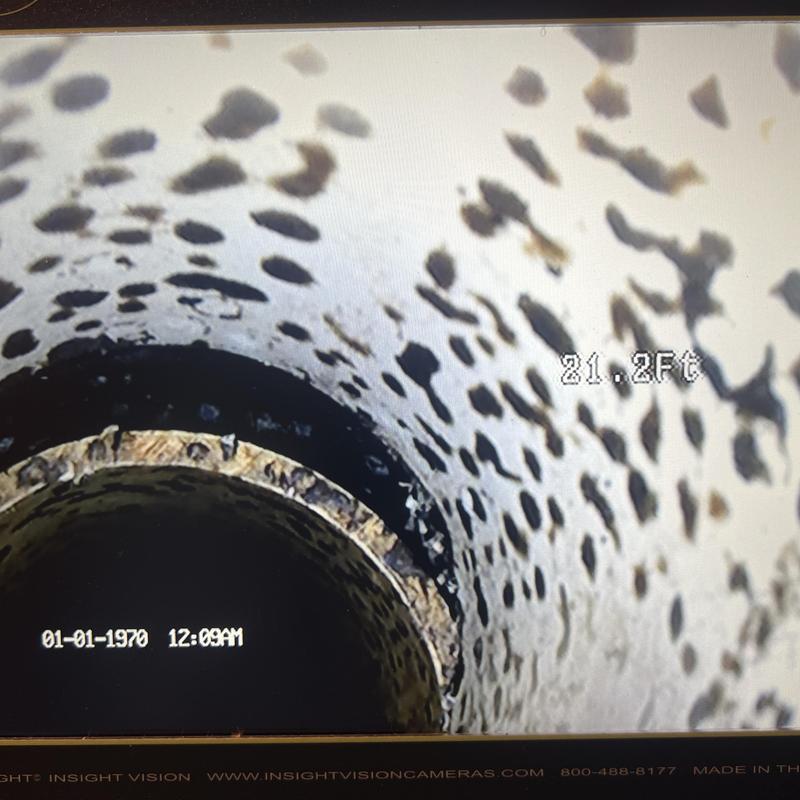 Sewer line interior showing mineral buildup at 21 ft Sewer line interior showing mineral buildup at 21 ft