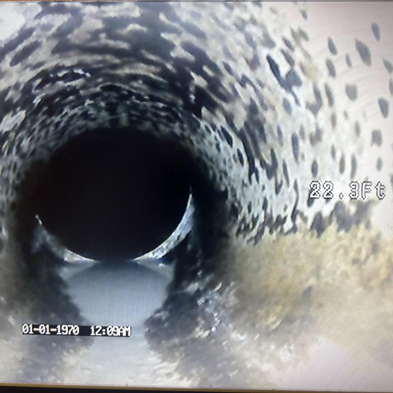 Sewer line interior with measurement at 22.3 feet Sewer line interior with measurement at 22.3 feet