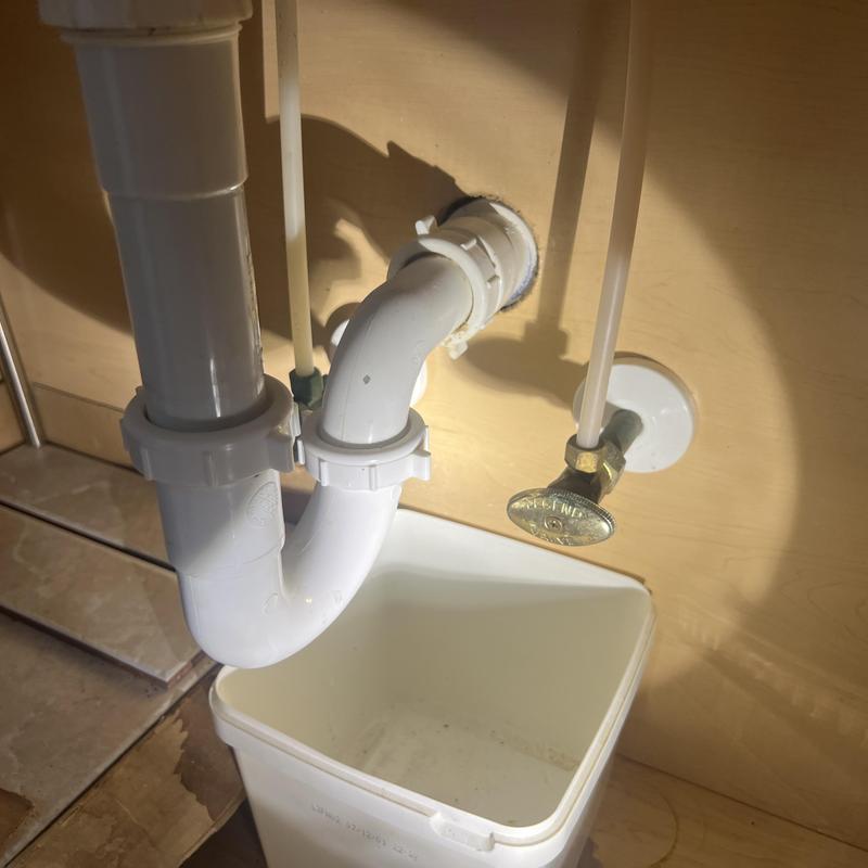 Vanity sink drain trap and shut-off valve installation Vanity sink drain trap and shut-off valve installation