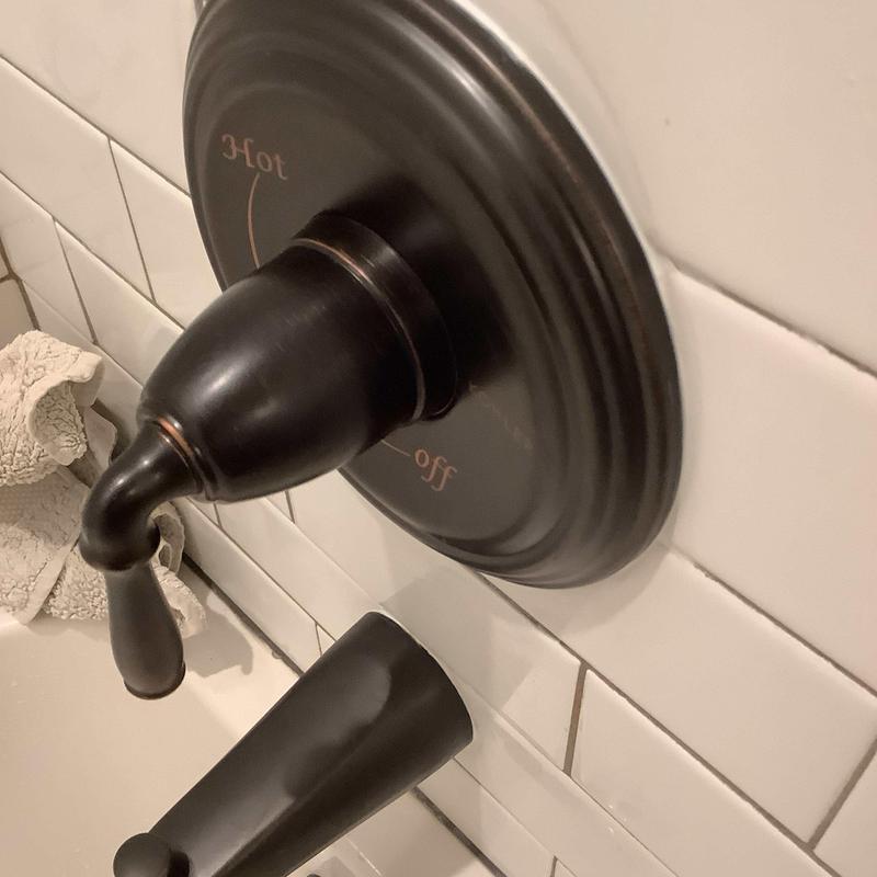 Tub and shower faucet trim with oil-rubbed bronze finish Tub and shower faucet trim with oil-rubbed bronze finish