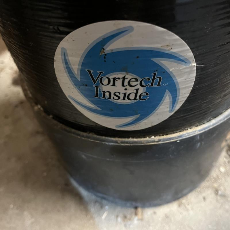 Water filtration system with Vortech tank label