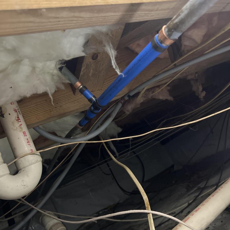 Quest waterline with copper fittings in basement ceiling Quest waterline with copper fittings in basement ceiling