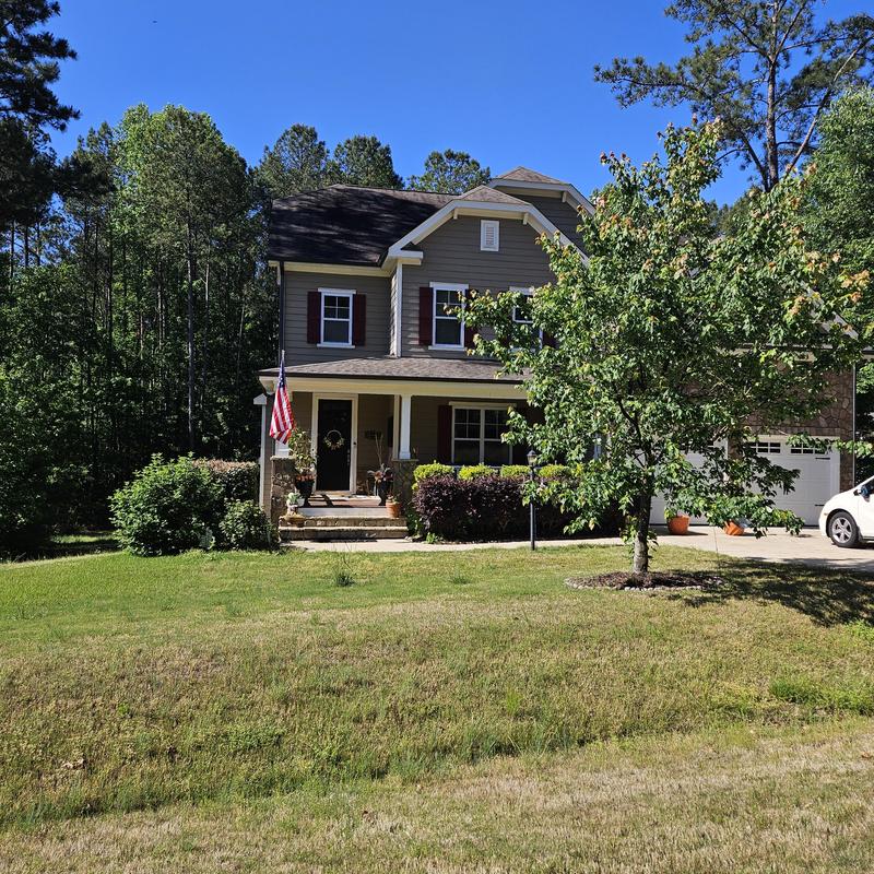 Front porch and landscaping for new home outdoor space