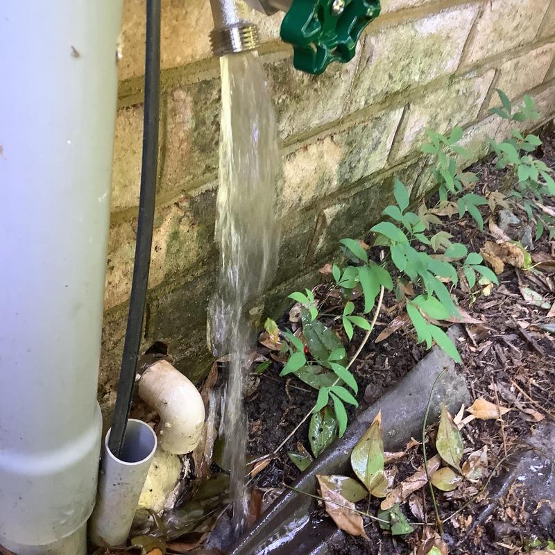 Frost proof hose bib with water flow near foundation wall Frost proof hose bib with water flow near foundation wall