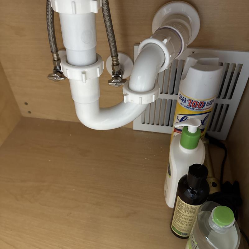 Sink drain pipe and shut off valves under cabinet Sink drain pipe and shut off valves under cabinet