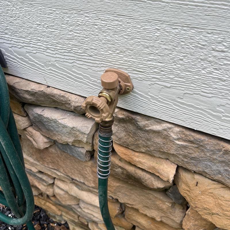 Woodford frost proof hose bib on stone wall Woodford frost proof hose bib on stone wall