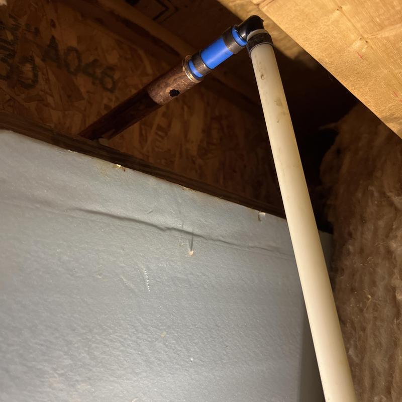 PEX pipe connection with copper fitting in attic space PEX pipe connection with copper fitting in attic space