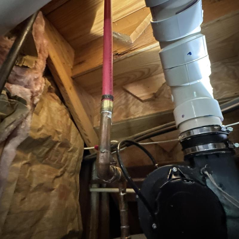 Hot water line and vent pipe near water heater Hot water line and vent pipe near water heater