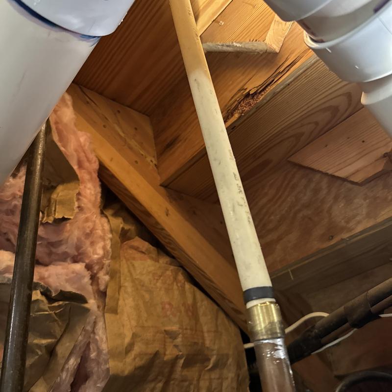 Hot water line with new brass fitting in attic Hot water line with new brass fitting in attic