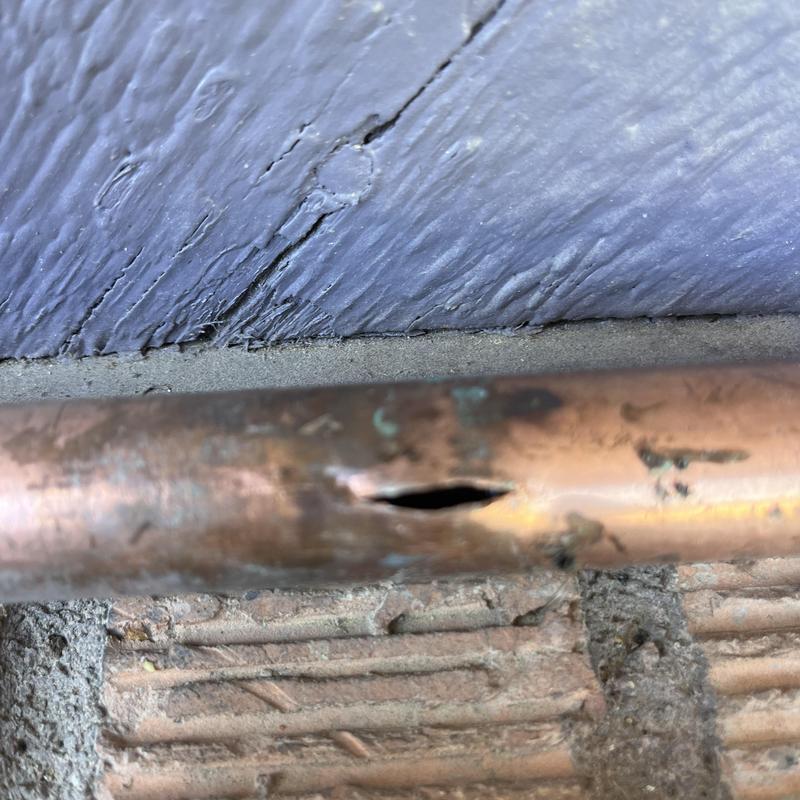 Copper water pipe with a split hole damage