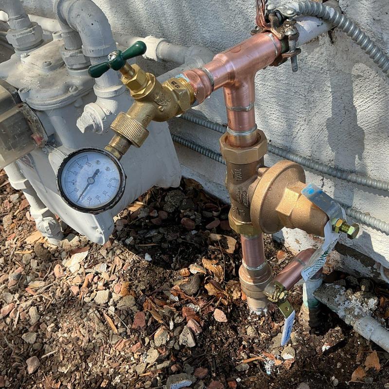 Copper main water riser with pressure regulator and valve