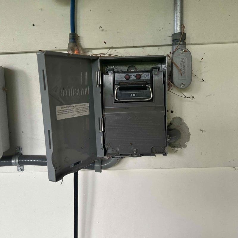 Electrical circuit breaker panel with open cover