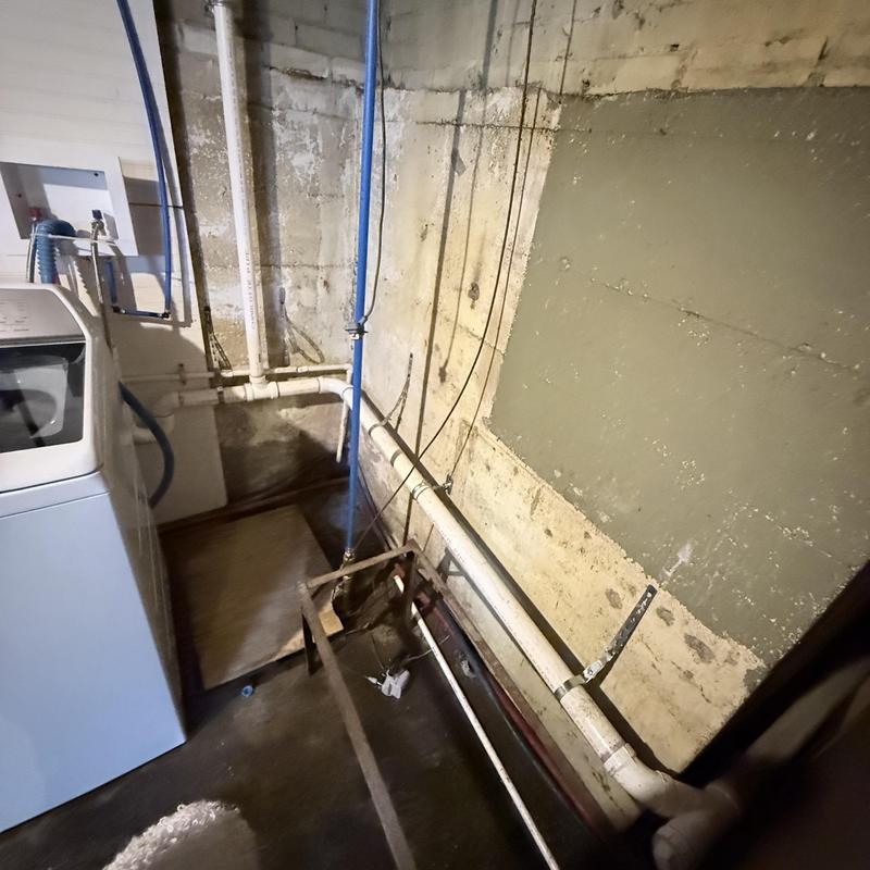 Laundry standpipe and drain pipework in basement Laundry standpipe and drain pipework in basement