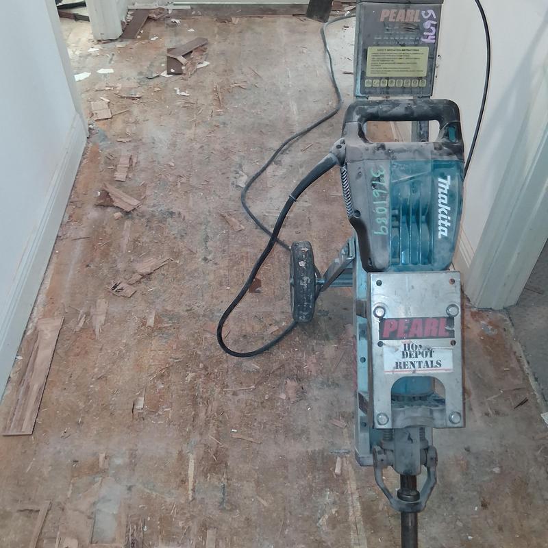 Hardwood flooring demolition with power floor scraper