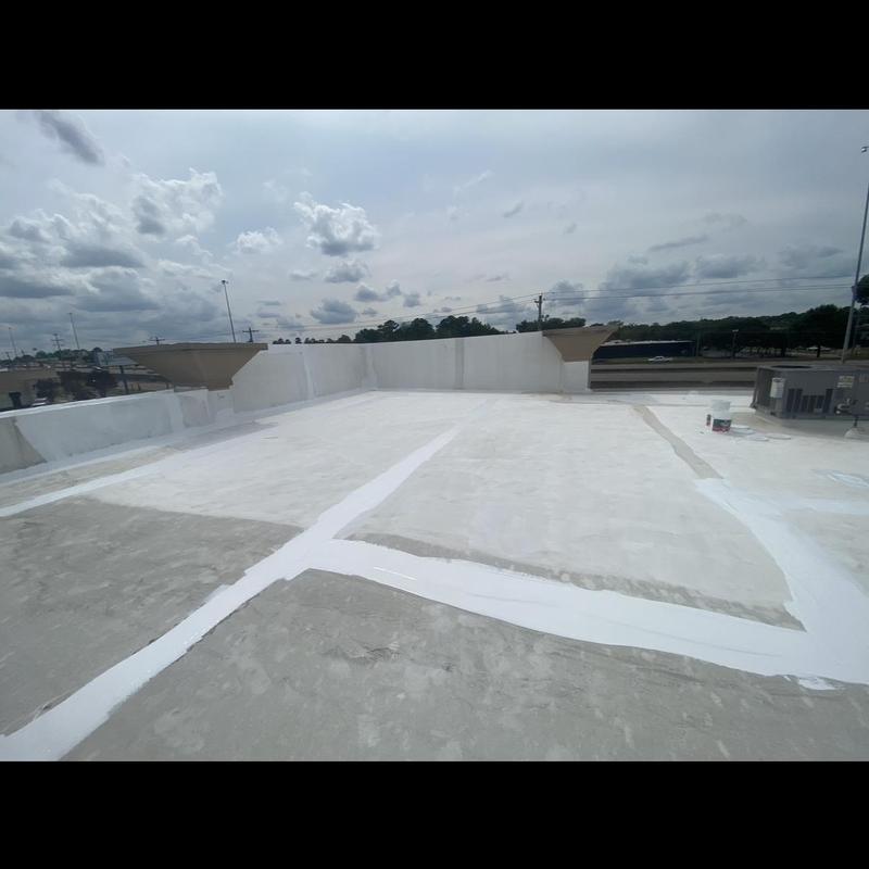 Roof membrane seams sealed with GAF high solids sealant