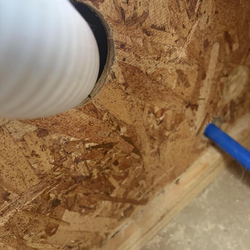 Bathtub drain pipe and plywood floor inspection