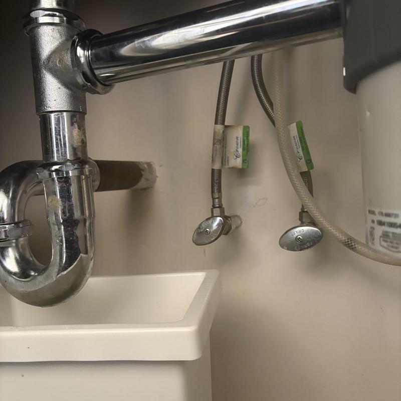 Chrome flat and threaded tailpiece under sink with valves Chrome flat and threaded tailpiece under sink with valves