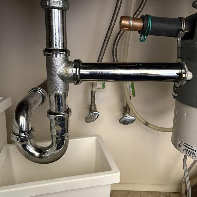 Chrome sink drain pipes with new fittings installation Chrome sink drain pipes with new fittings installation