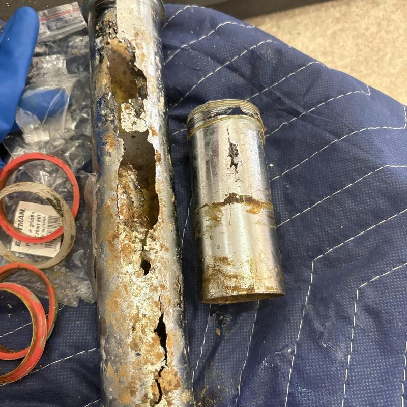 Corroded plumbing tailpieces removed for drain repair Corroded plumbing tailpieces removed for drain repair