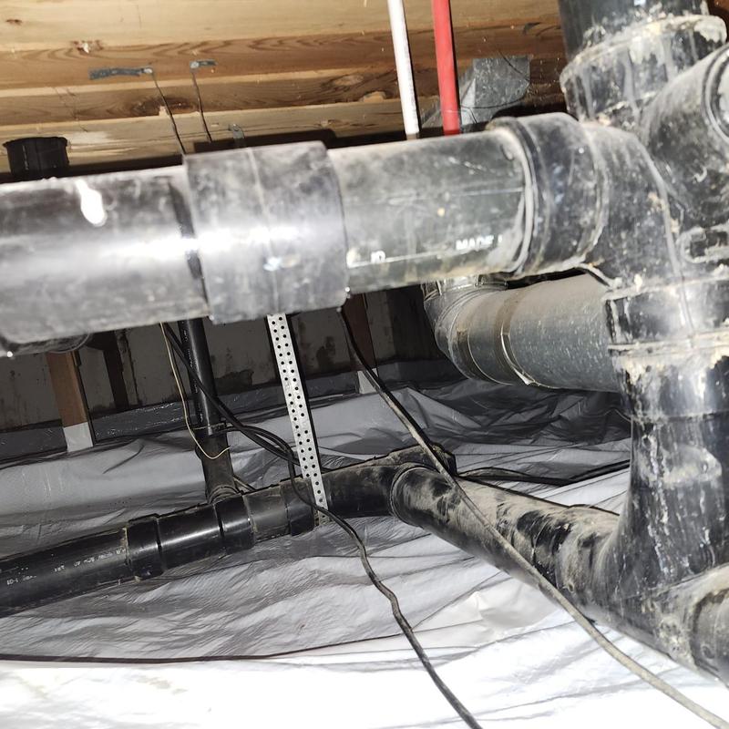 Kitchen sink ABS drain pipes in crawl space