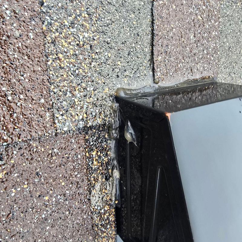 Pipe jack on shingle roof with sealant damage Pipe jack on shingle roof with sealant damage