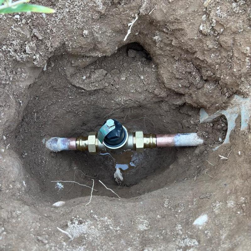 Pressure relief valve installed next to main water meter