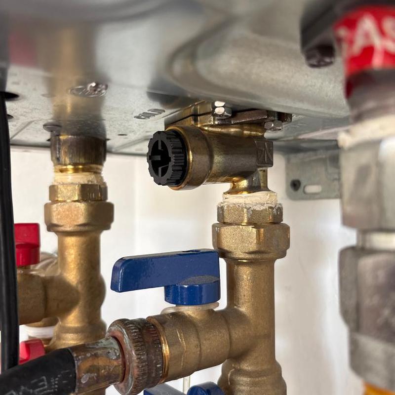 Tankless water heater cold water intake filter cleaning